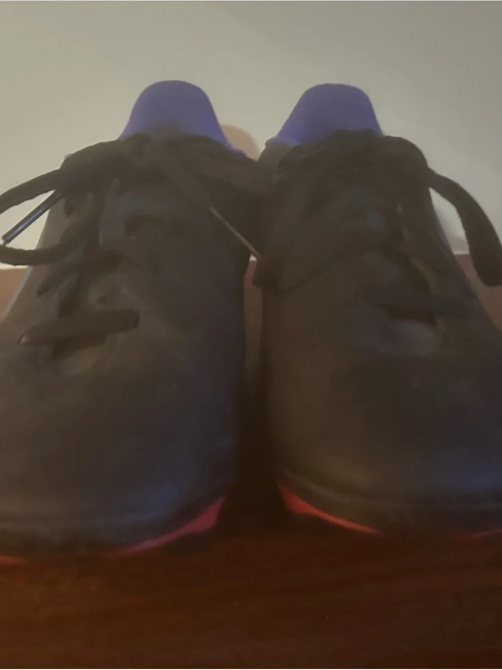 adidas Black Cleats with Blue Accents and Red Studs